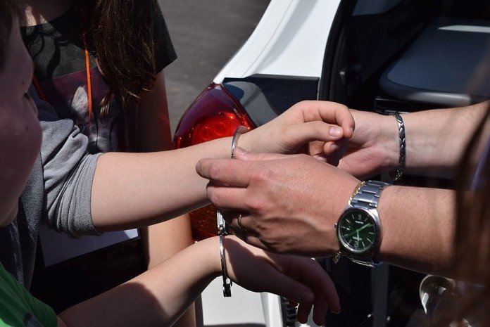 police officer arresting