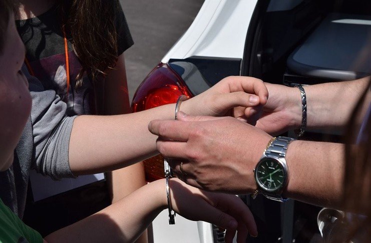 police officer arresting