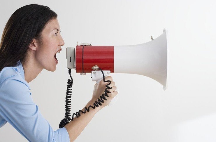 woman talking with megaphone