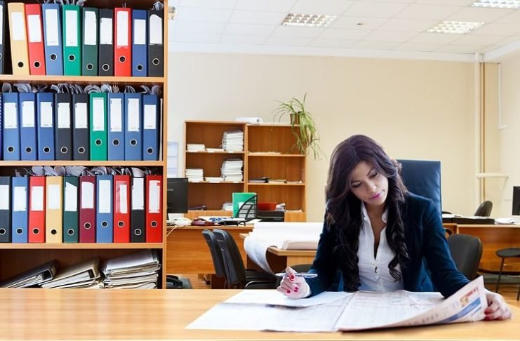 business woman reading