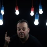 man shows light bulbs