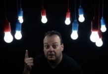 man shows light bulbs