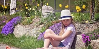 girl sitting alone